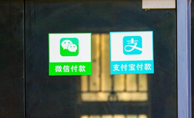移动支付在新加坡 双巨头争夺中国游客